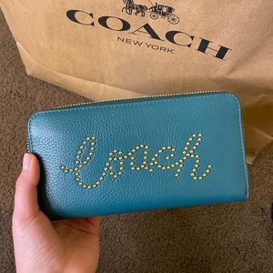 COACH zip wallet with studded coach script